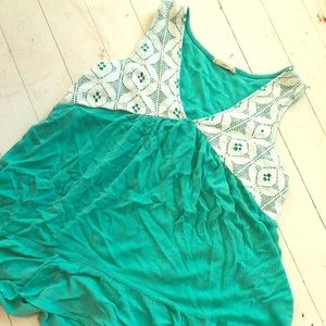 Large Sleeveless Teal shirt with lace accents.